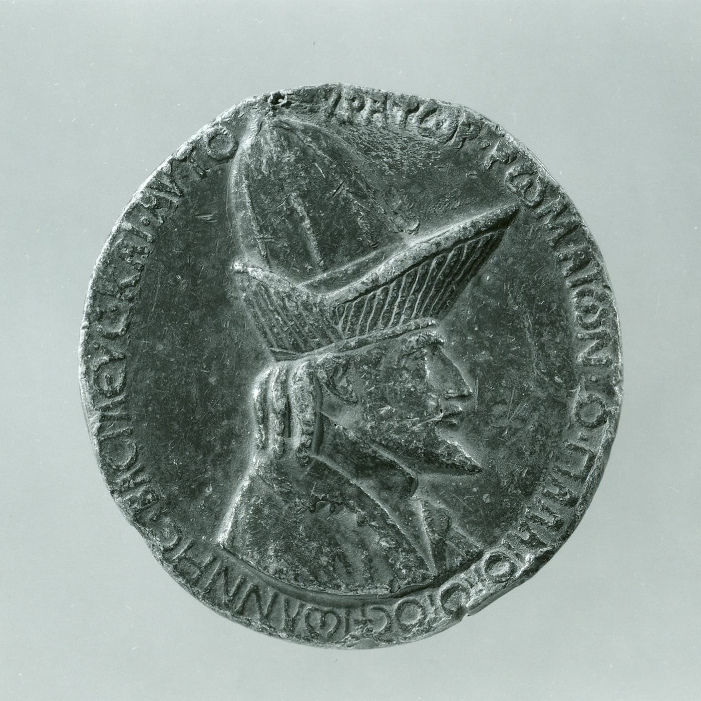 Lead medal showing the Byzantine emperor John VIII Palaeologus in profile, wearing a tall brimmed hat, with a Greek inscription around the rim